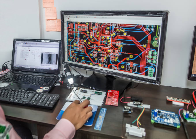 svatar engineer is designing pcb board for beauty equipment